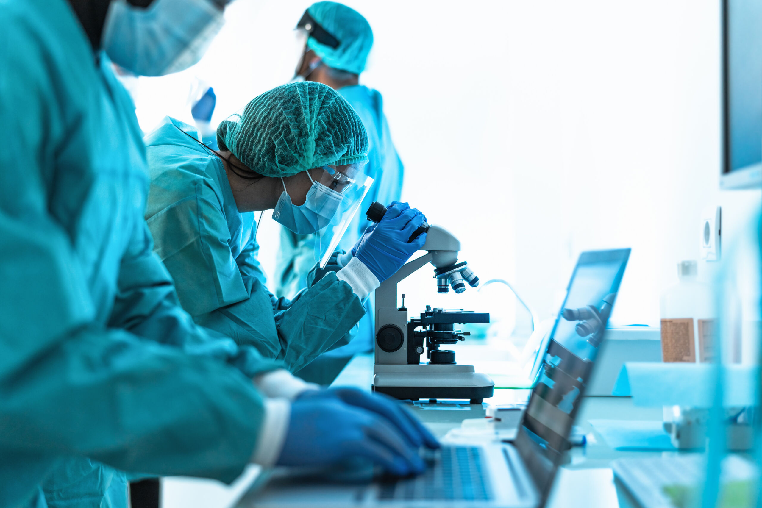 Medical workers doing analysis in laboratory during corona virus