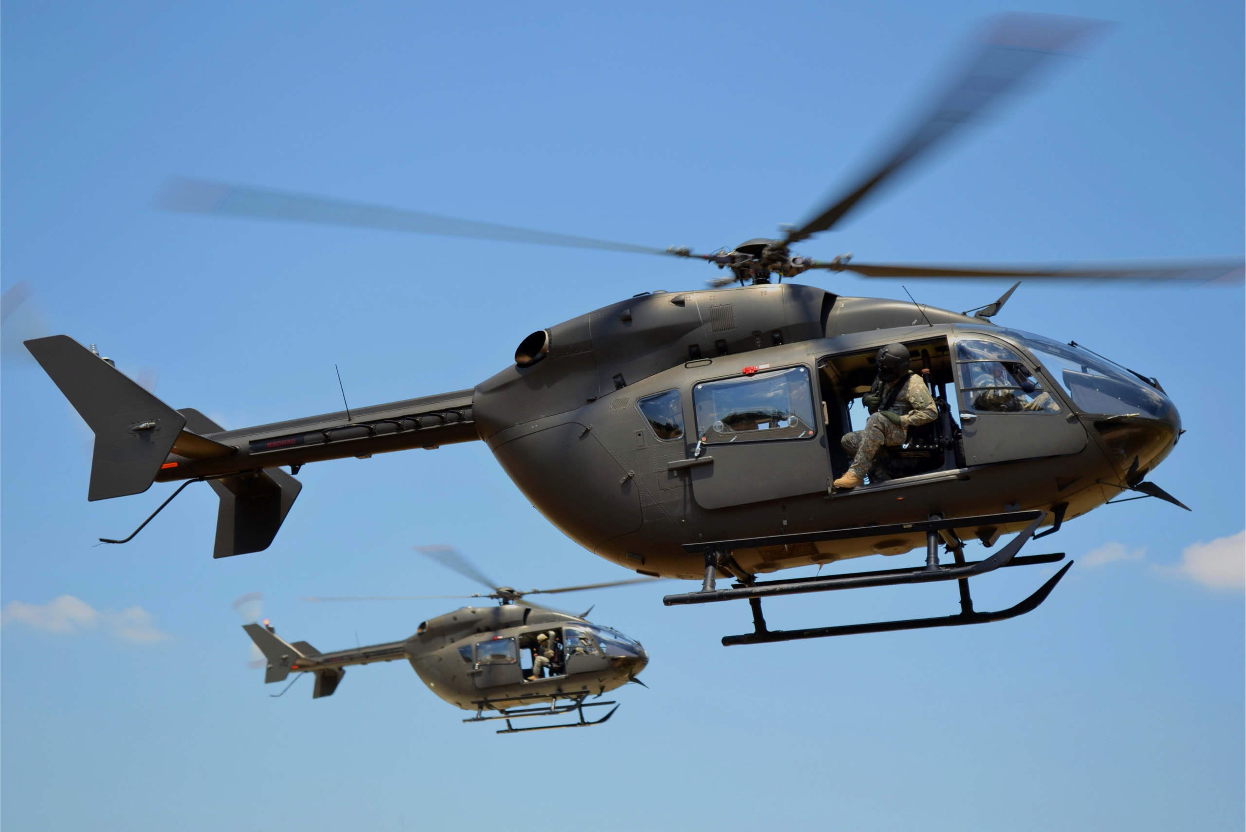 Two Lakota Helicopters Flying